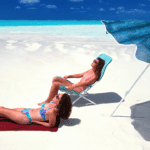 Women on bikini sunbathing